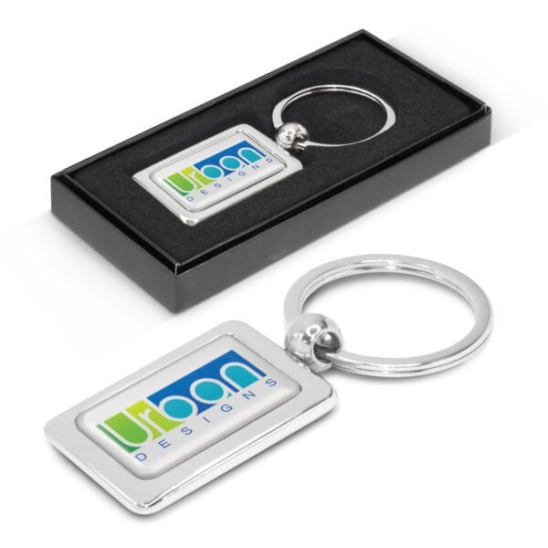 Custom branded metallic keychains with engraved logos, premium finish, and durable rings